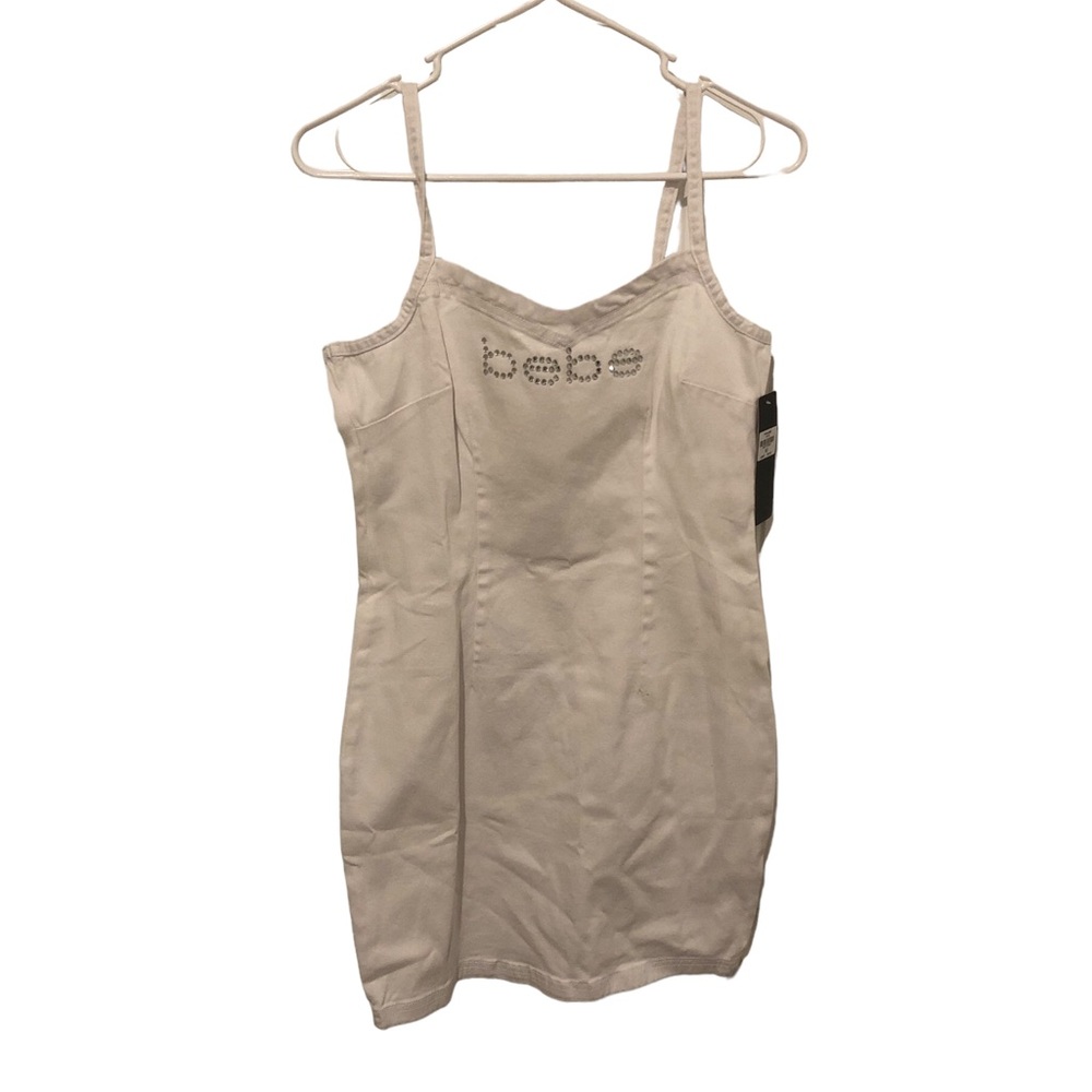 NWT Bebe white dress size medium cotton with a little stretch spandex cute short